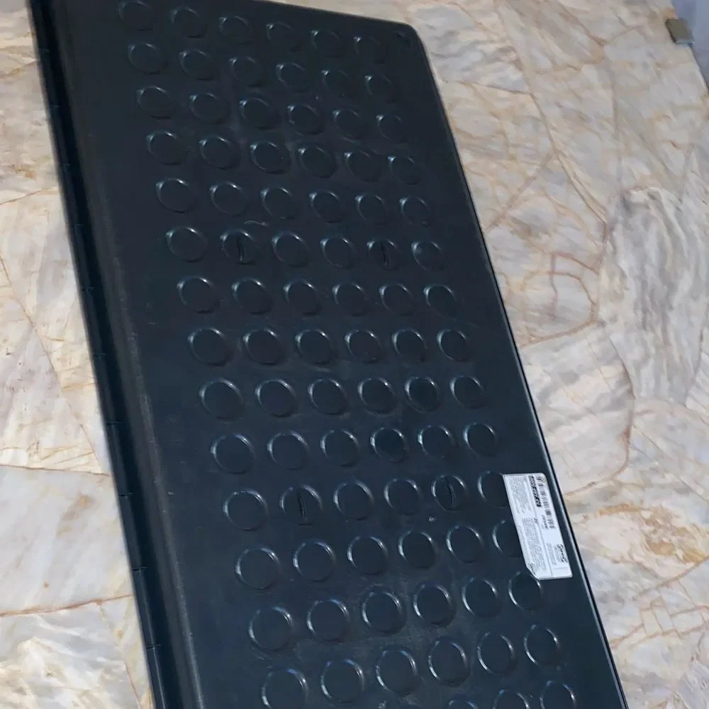 Black Rubber Tray em is the BAGGMUCK shoe tray from IKEA